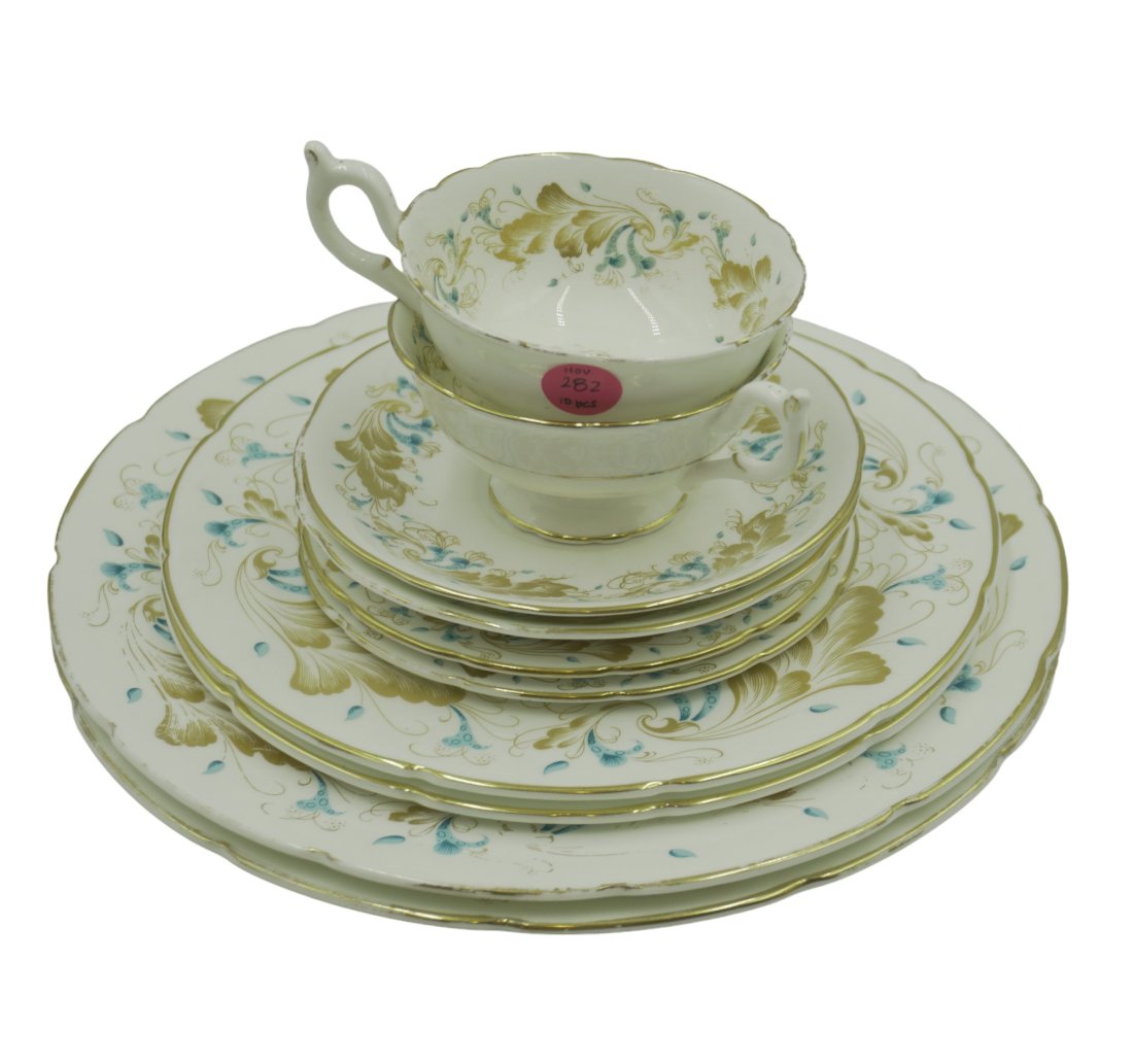 COALPORT "STRANGE ORCHID" PLATES, CUPS, SAUCERS - 10 PIECES: 10 pieces of Coalport bone china in the pattern "Strange Orchid". 2 dinner plates, 2 side plates, 2 bread and butter plates, 2 teacups and saucers. Total lot weight is 6 lbs 13.3 oz. Largest piece mea