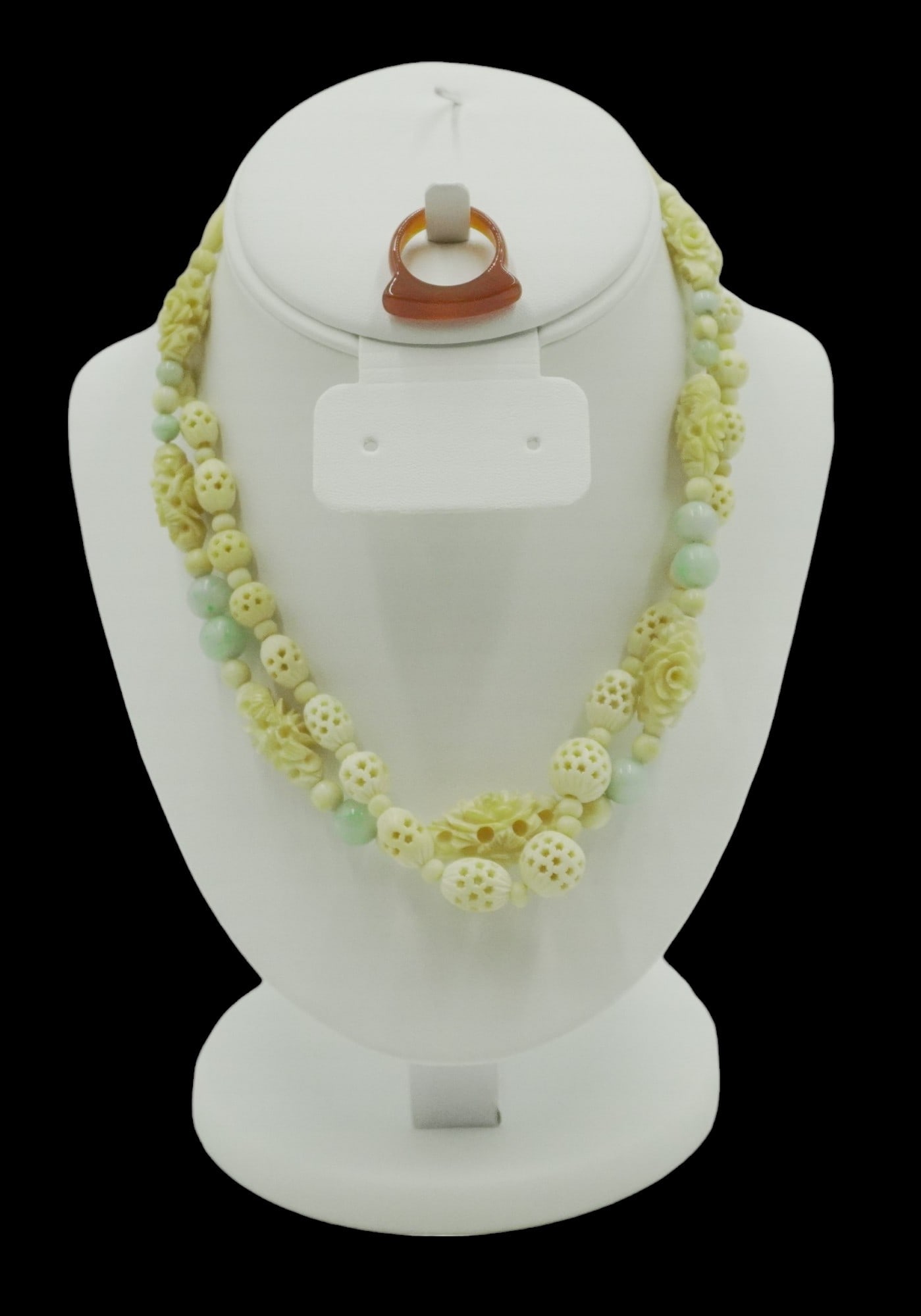 3 PC 1940s CARVED BONE & JADE NECKLACES & RING: 1 - Carved & Pierced Graduated 17" opened 2- Intricately carved Floral and Pale Green Jade Necklace 17". 3- Carved Red Jade Ring size 8. Weight on all 1.9 oz.