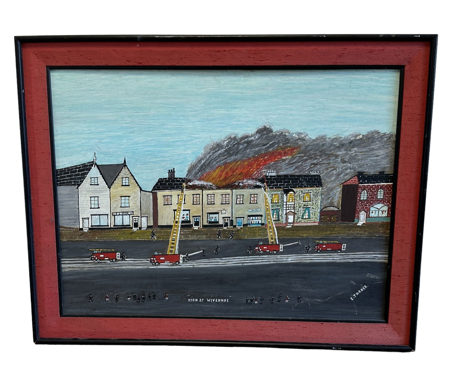 ERNIE TURNER NAIVE FOLK ART PAINTING FIRE IN WIVENHOE: Vintage 1960s Naive Folk Art Painting on Masonite by English Artist Ernie Turner (died 1977) of the Fire Department of Wivenhoe battling a blaze on High Street. Ernie Turner started painting in 1964 w