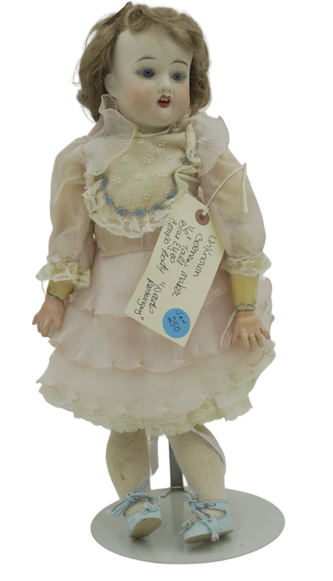 ANTIQUE GERMAN PORCELAIN BISQUE DOLL 16": Antique German Bisque Head Doll with Composite Body. Blue glass eyes, open mouth 2 teeth. Maker unknown, measures 16". Weight 2 lbs