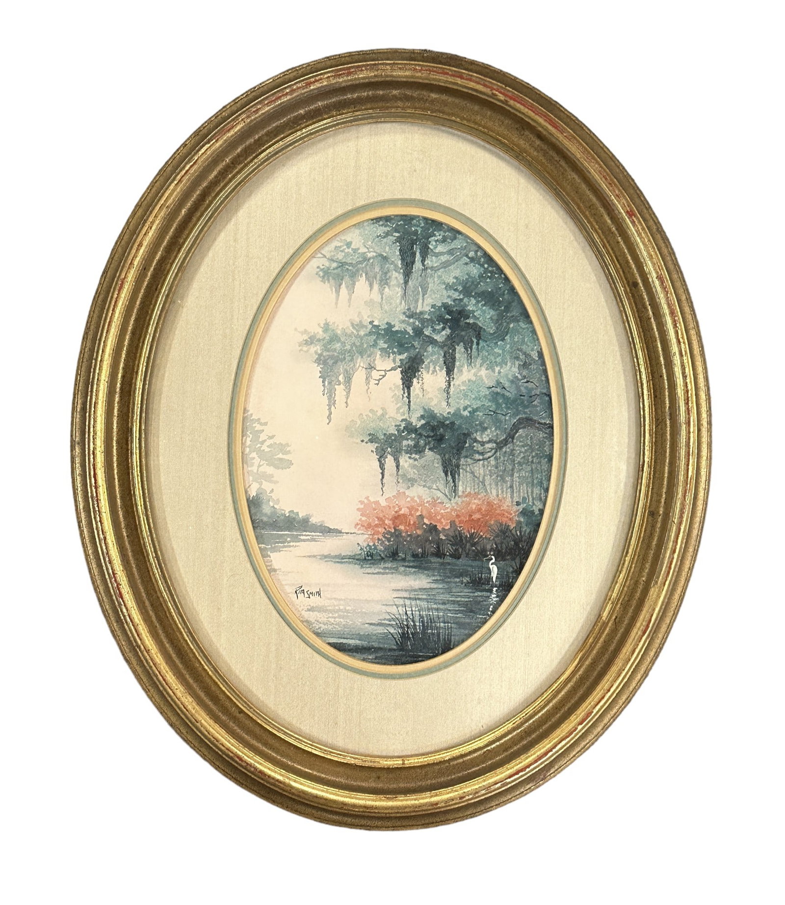 RITA SMITH LOWCOUNTRY LAGOON WATERCOLOR: Original Rita Smith Watercolor. Lowcountry lagoon early morning with spanish moss and snowy egret. Signed by the artist lower left. Professionally framed and double matted in oval convex glass gilt wo