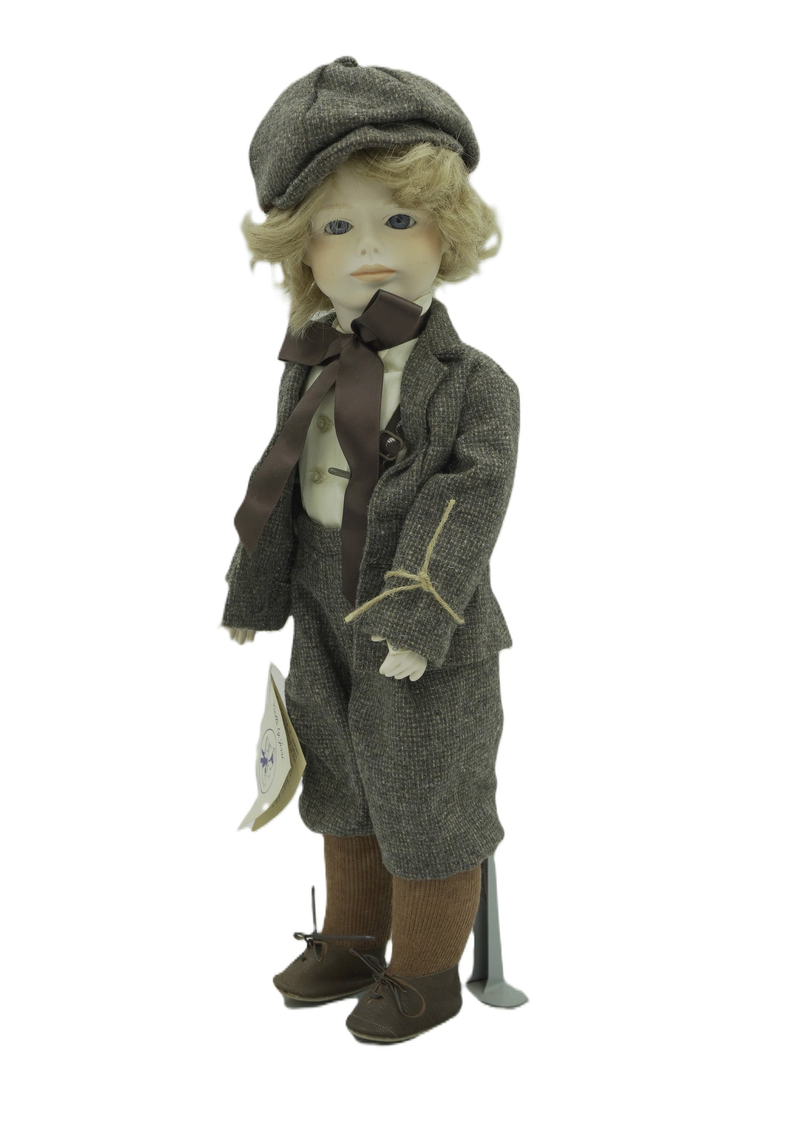 ORIGINAL JERRI DOLL TOM SAWYER: Original Porcelain Jerri Doll "Tom Sawyer" with stand. Measures 6"x6"x18". Weight 3 lbs 11 oz.
