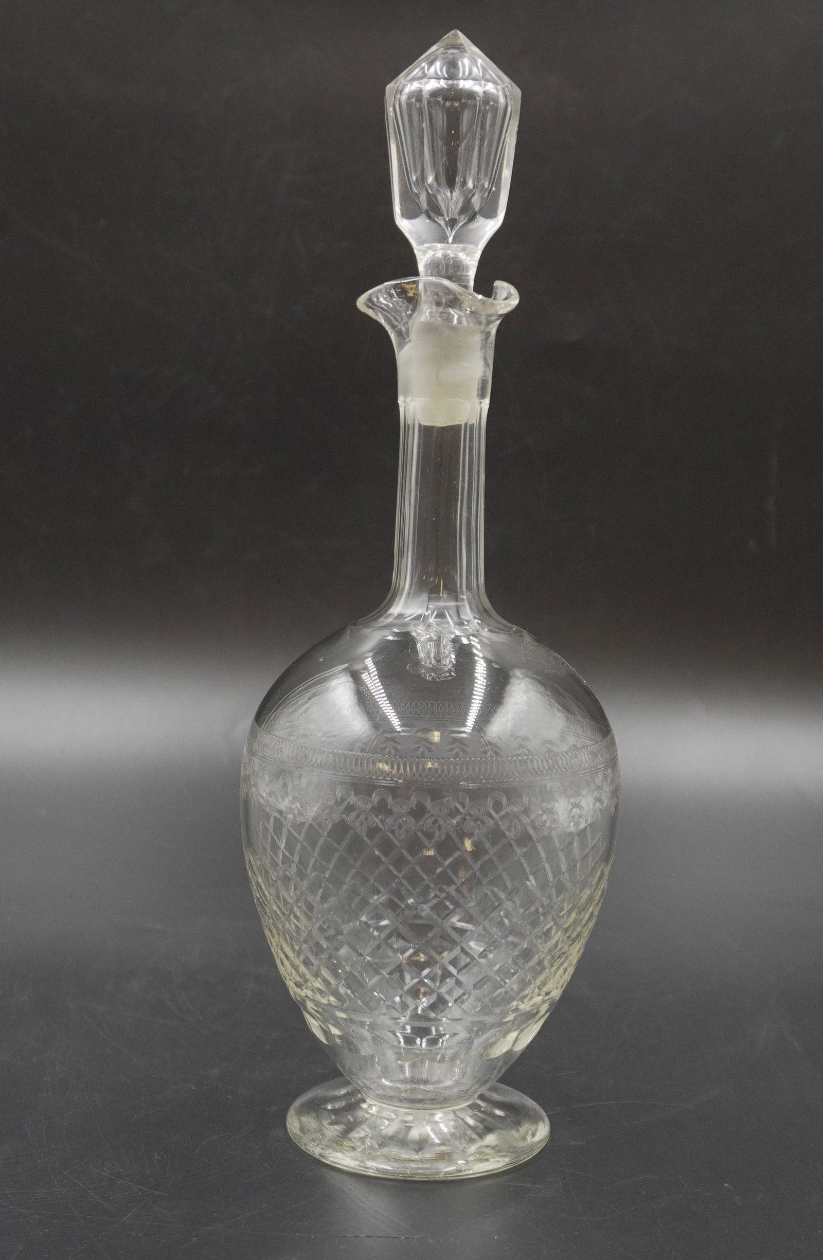 VINTAGE BACCARAT CRYSTAL ROHAN DECANTER: Vintage Baccarat Crystal Decanter in the "Rohan" Pattern. The Rohan collection is acid etched, giving the Baccarat crystal an elegant originality. To top of stopper 10". Weight 14 oz