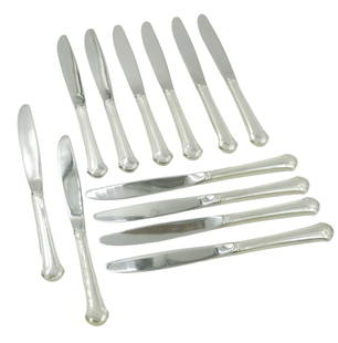 12 STERLING SILVER CHIPPENDALE DINNER KNIVES: Twelve (12) Towle Sterling Silver Chippendale New French Hollow Knives 8 7/8". Stainless Blades. Weight 1 lb 4 oz. Chippendale silver by Towle features a curvaceous, understated design decorated with