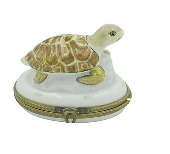 RARE SEA TURTLE LIMOGES BOX: Rare sea turtle Limoges box, hand painted porcelain from france. Featuring a horse shoe clasp and grass painted on inside. Signed "Peint Main Limoges GL" on bottom. Measures 2" tall, 2 1/4" long and 1