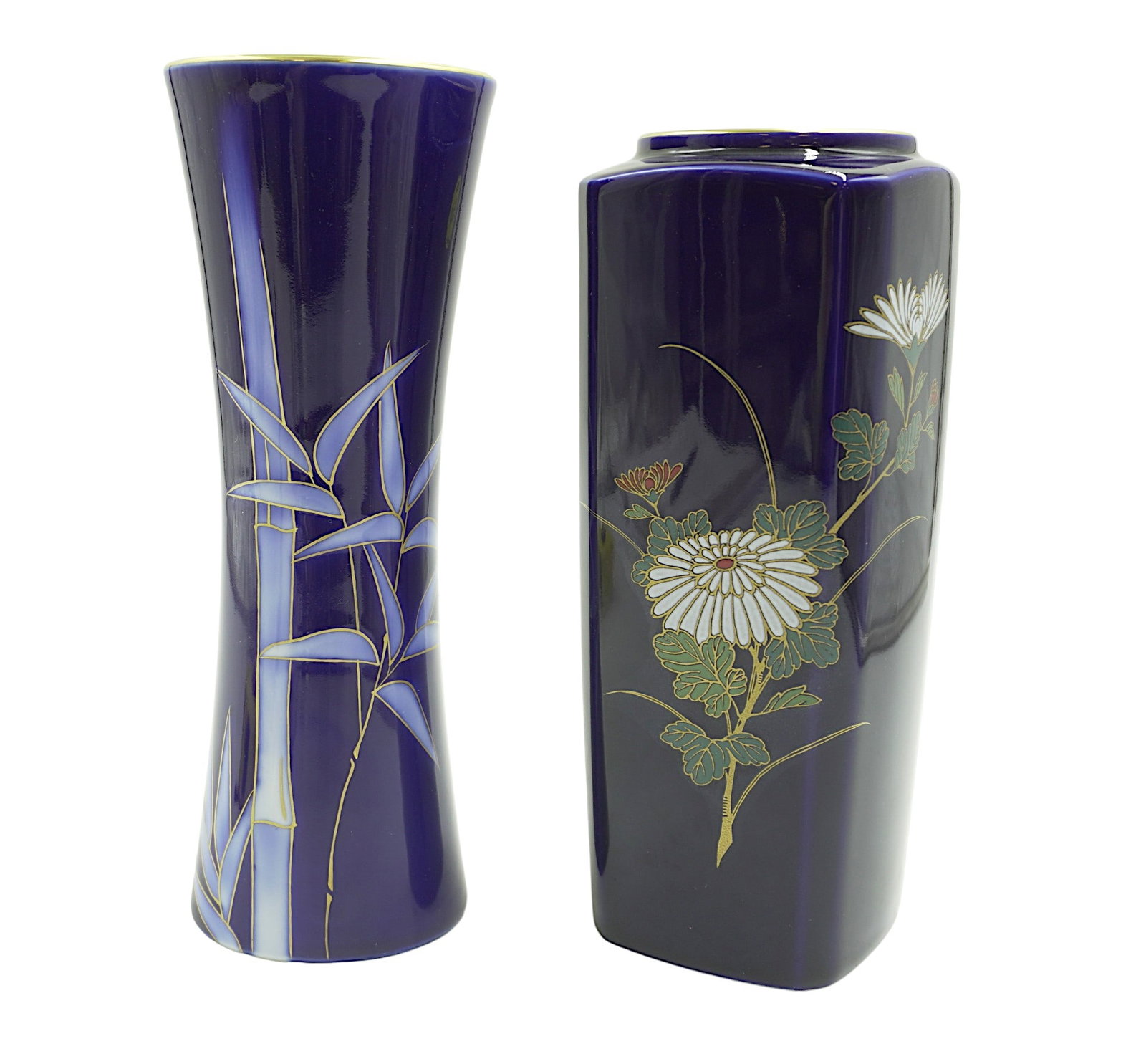 VINTAGE JAPANESE OTAGIRI VASES - 2 PIECES: 2 vintage Japanese Otagiri vases. One featuring handpainted floral and gold detailing on top, measures 8" tall and about 4" in diameter. One featuring bamboo with gold details, measures 8.5" tall and 