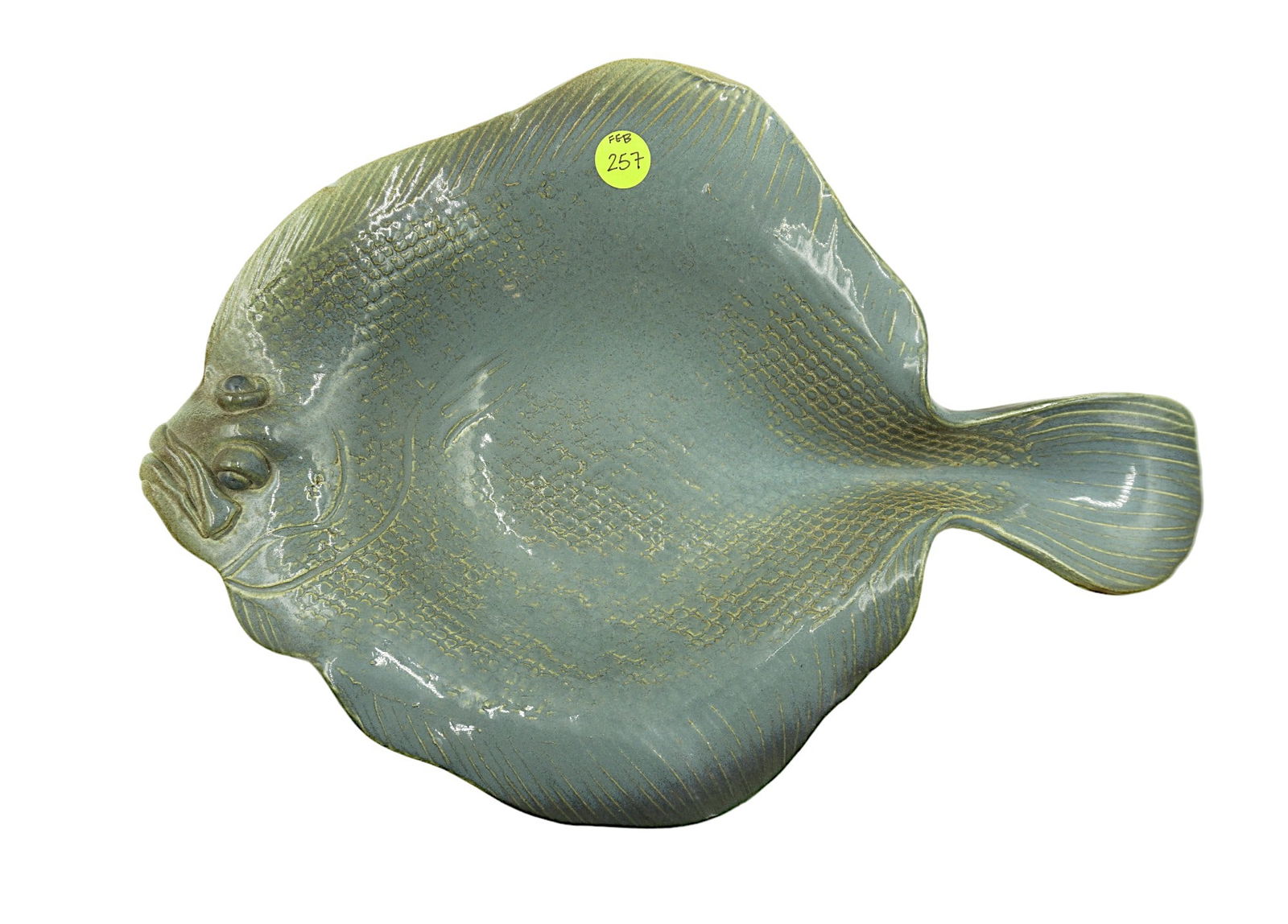 ROSALIE NADEAU FLOUNDER POTTERY DISH: Rosalie Nadeau is a potter, widely acclaimed for her lifelike stoneware interpretations of flounder and striped bass. Her familiarity with flounders began with her commercial fishing experience where