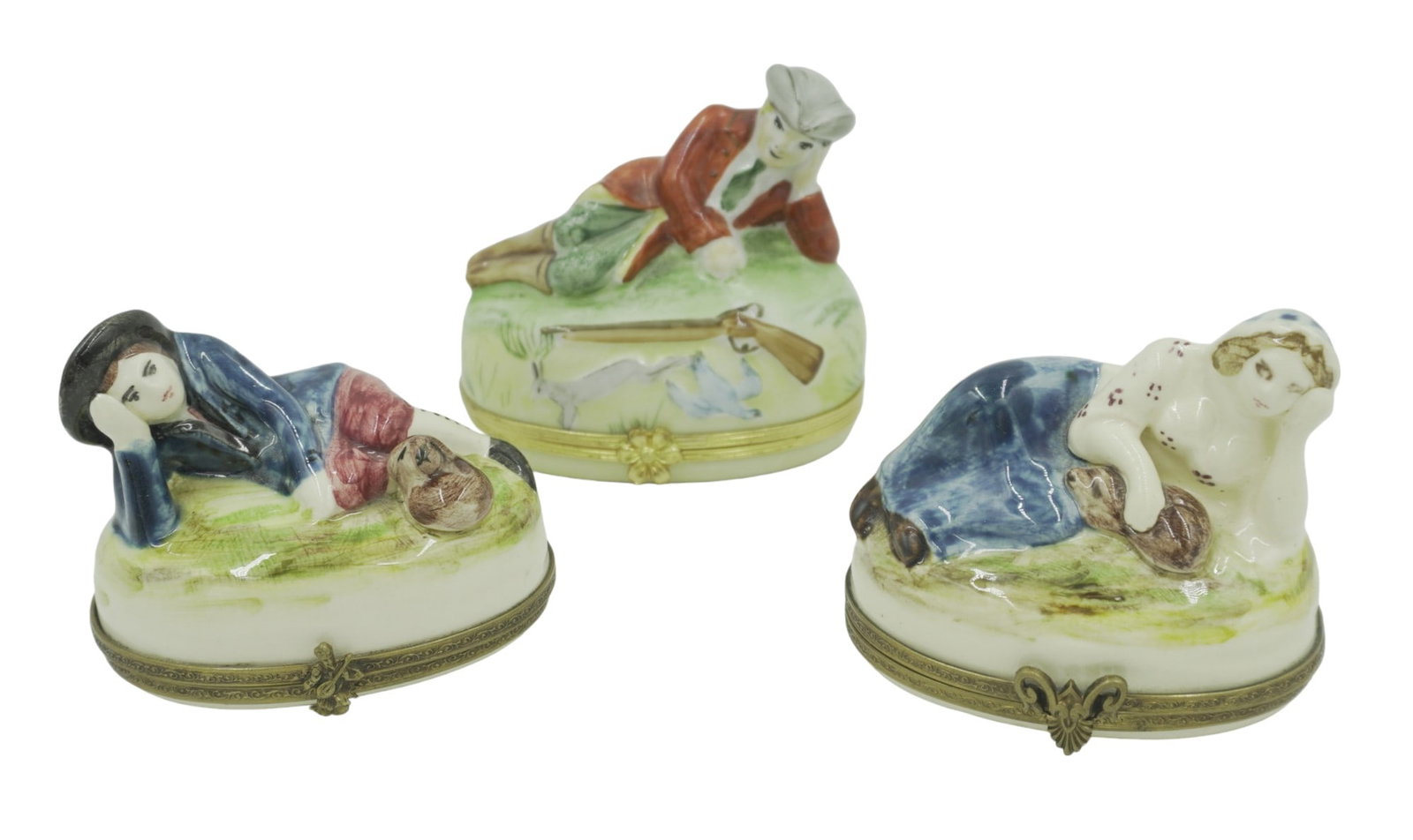 LIMOGES BOXES LOT OF 3: 3 Limoges Boxes. All hand painted porcelain from france. This lot includes 1) Man laying down with gun and animals hunted. Flower clasp. Signed "Limoges France Peint Main MG" on bottom. Measures 3" ta