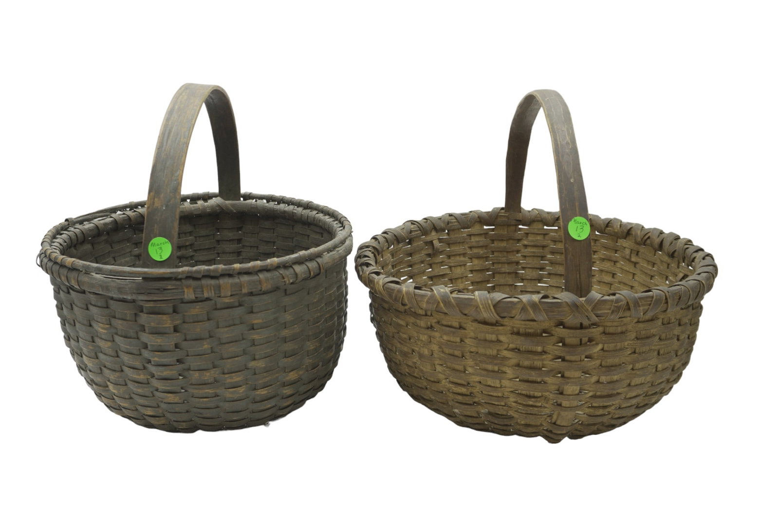 2 ANTIQUE AMERICAN SPLINT MARKET BASKETS: Pair of Antique American Splint Market Baskets from Massachusets. Both with carved Wood Handles. 14.25"x14.25"x14" and Double Rim 12"x12"x13". Weight combined 3 lbs 3 oz. PROVENANCE: A Private Collect