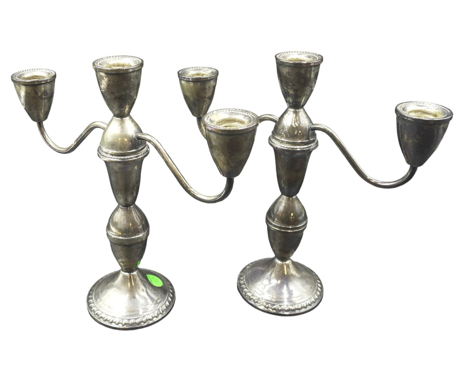 PAIR VINTAGE STERLING SILVER CANDELABRA: Pair Sterling Silver Weighted Duchin Convertible Candleabras. Each 9"x3.5"x9.75". Weight 2 lbs 14 oz.