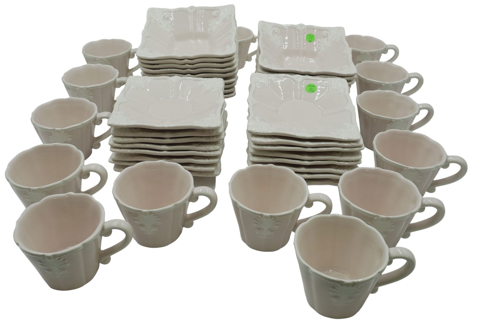 48 PC NEIMAN MARCUS BAROQUE BOWLS - CUPS - SAUCERS: 48 Pc Pink and Cream Baroque Dinnerware. Square, baroque-design dinnerware handcrafted in Portugal of earthenware for Neiman Marcus.16 Saucers 6.5"x6.5. 16 Bowls 7"x7". 16 cups 5"x4"x3.2,5". Combined