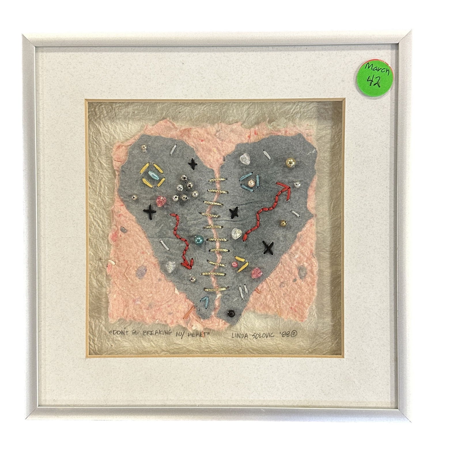 LINDA SOLOVIC MIXED MEDIA HEART: Mixed Media Collage "Don't Go Breaking my Heart" by St. Louis contemporary folk artist, Linda Solovic. In Shadowbox Frame. In frame measures 8 1/2"x8 1/4"x1 1/2". Weight 1 pd 6 oz. PROVENANCE: A Priva