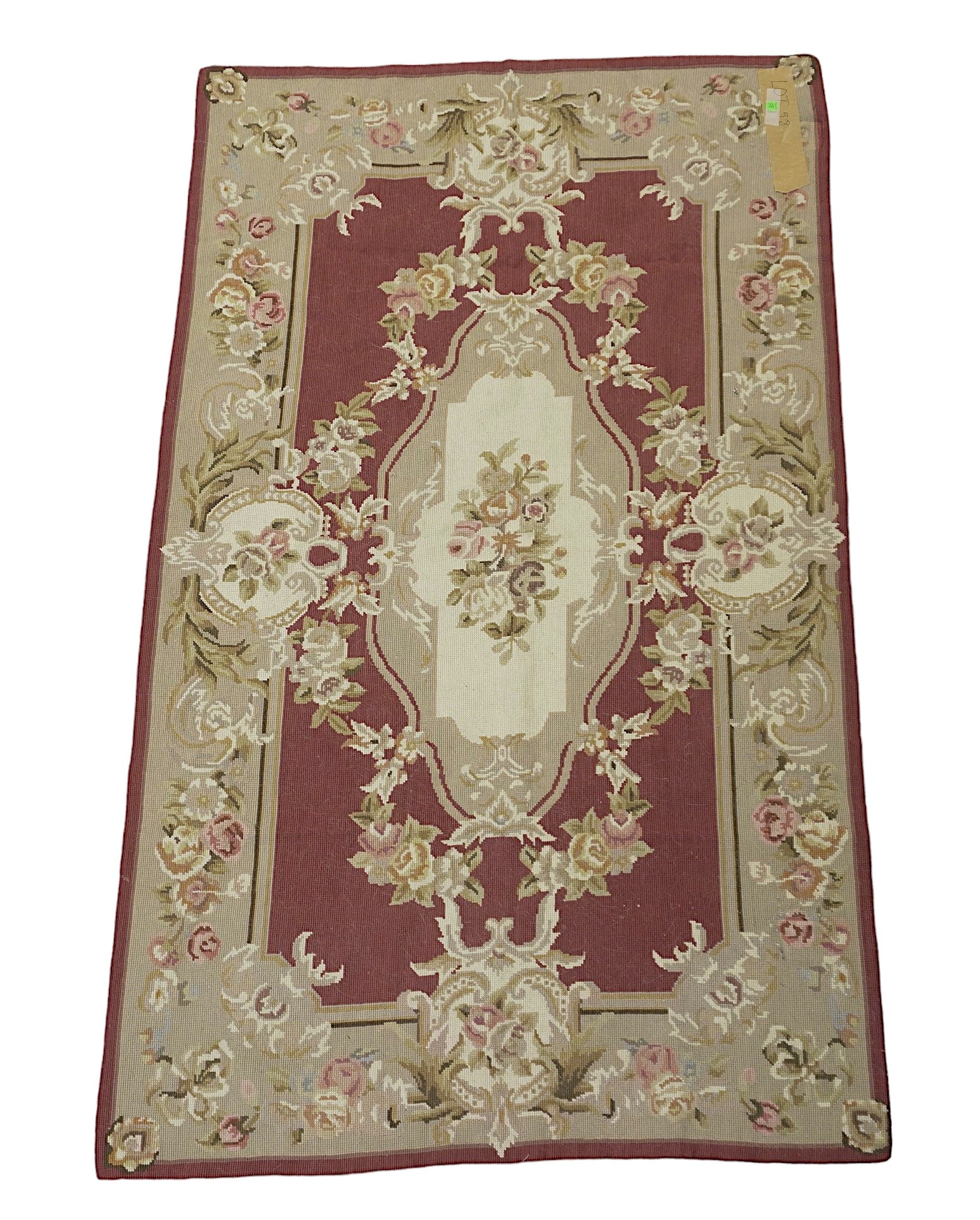 VINTAGE AUBUSSON RUG: Vintage French Aubusson Rug. Roses with classic colors of deep rose, green, taupe and cream. In good condition, measures 58"X35". Weight 4 pds. PROVENANCE: A Charleston SC Private Estate