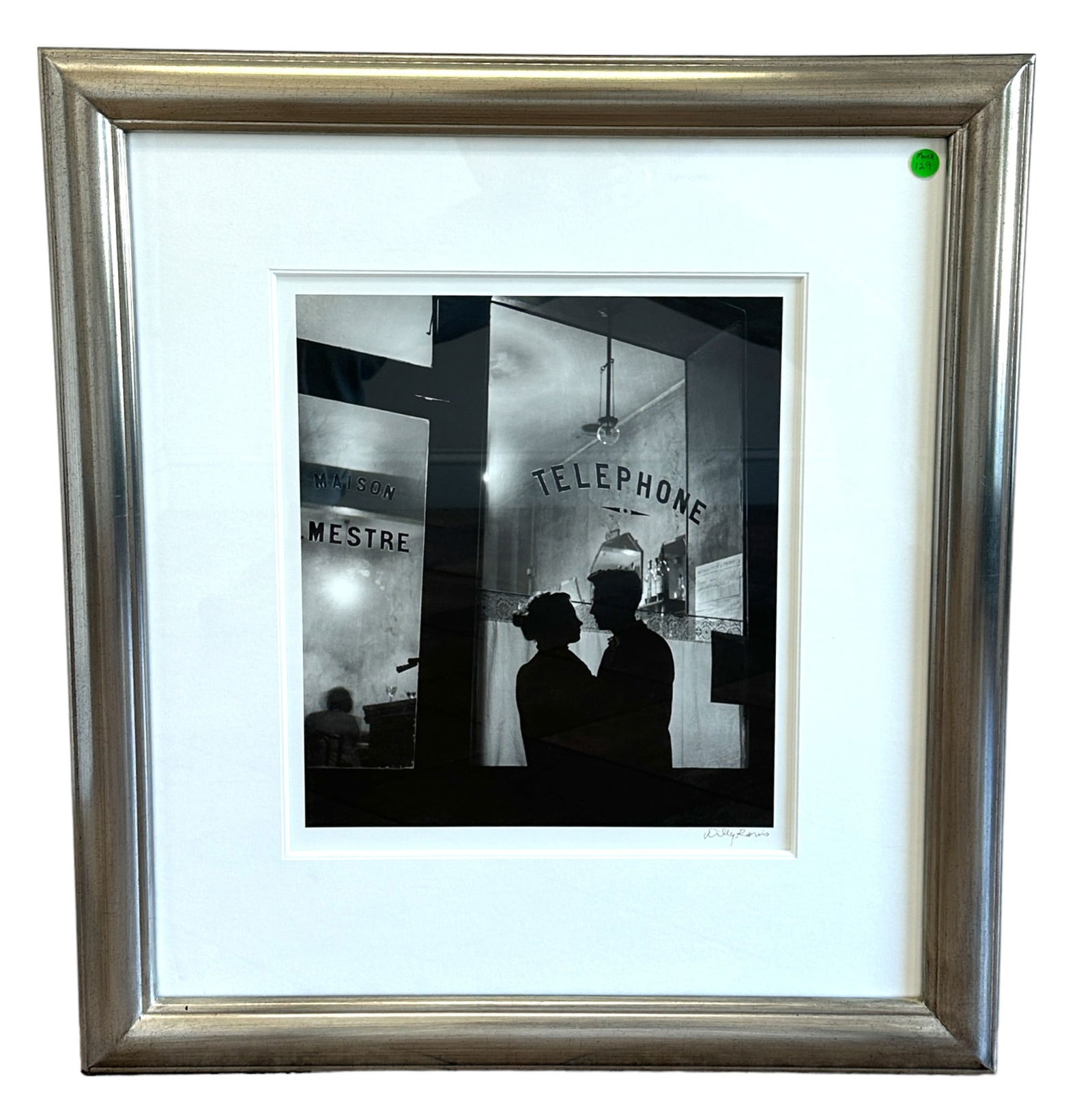 WILLY RONIS SIGNED MENILMONTANT (DEVANT CHEZ MESTRE): Willy Ronis (1910-2009) Signed Silver Gelatin Photograph, Menilmontant (Devant Chez Mestre), 1957, printed later. in 2004. Signed by Willy Ronis in ink.With studio stamp en verso. In frame with mat me