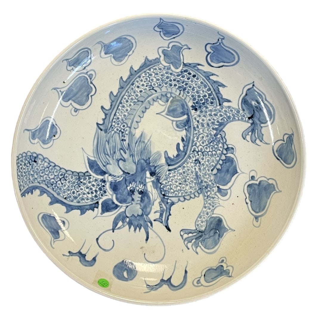 LARGE ANTIQUE QING DYNASTY DRAGON CHARGER: Large Chinese Qing Dynasty Hand Painted Blue on White Dragon Charger. Dragon chasing the elusive pearl of wisdom with clouds and bats. 18.25"x18.25"x3. Weight 11 lbs.