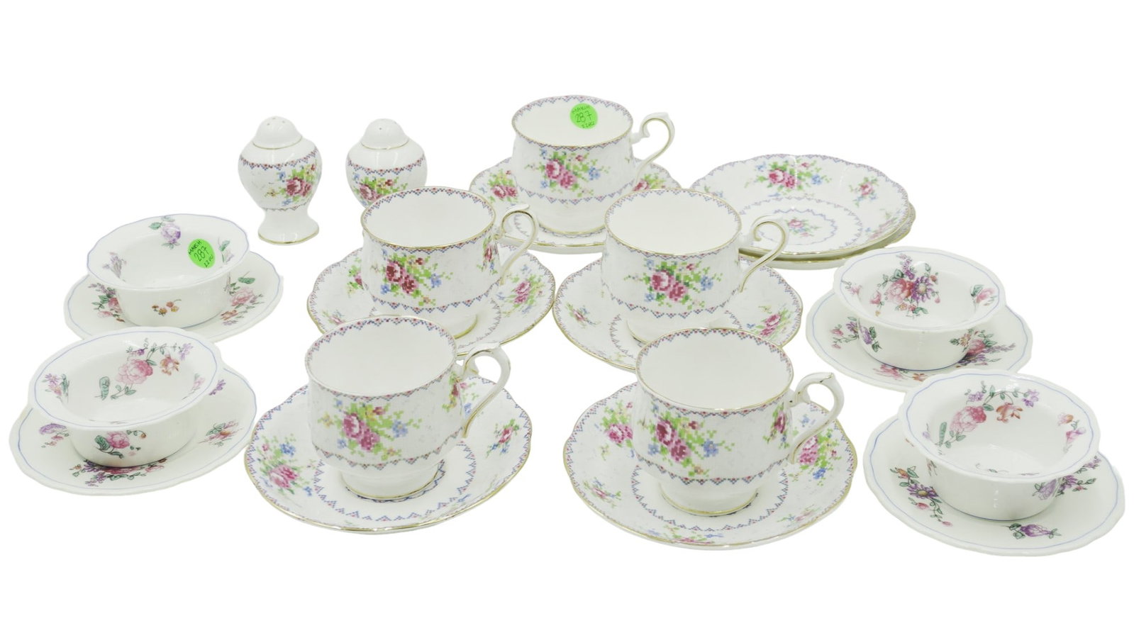 LOT OF ENGLISH BONE CHINA - 22 PIECES: 22 pieces of english bone china including 1) 4 Jones, Georges, and Sons Ramekins with matching saucers 2) Royal Albert Bone China in the pattern "Petit Point". 5 Teacups, 7 saucers, 2 S&P shakers. Tot