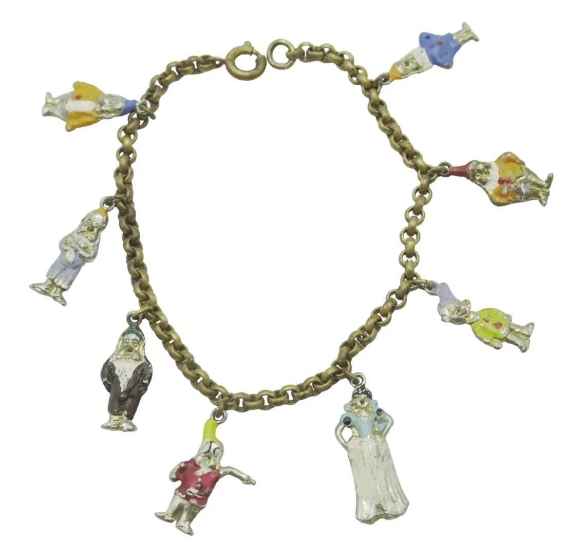 1938 DISNEY ENAMELED SNOW WHITE & 7 DWARFS BRACELET: Original 1938 Disney Snow White & 7 Dwarfs Charm Bracelet hand painted enamel. 7" opened. Weight 0.4 oz.