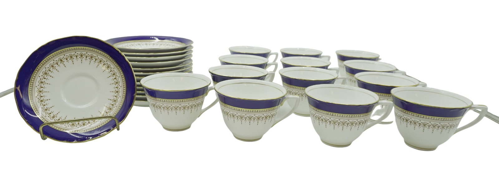 26 PC ROYAL WORCESTER REGENCY BLUE CUPS & SAUCERS: 26 Piece Royal Worcester Regency Blue Cups & Saucers. Cobalt Blue On White With Gold Decor. Cups 2 5/8". Saucers 5.75". Excellent condition. Weight 9 lbs 4 oz.