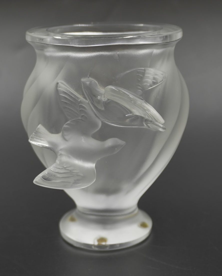 MARIE-CLAUDE LALIQUE SIGNED ROSINE VASE: Marie-Claude Lalique signed Lalique France "Rosine" flying dove figural crystal vase in transparent & frosted glass, featuring an oval shaped wide rim flaring along the body accented with doves flying