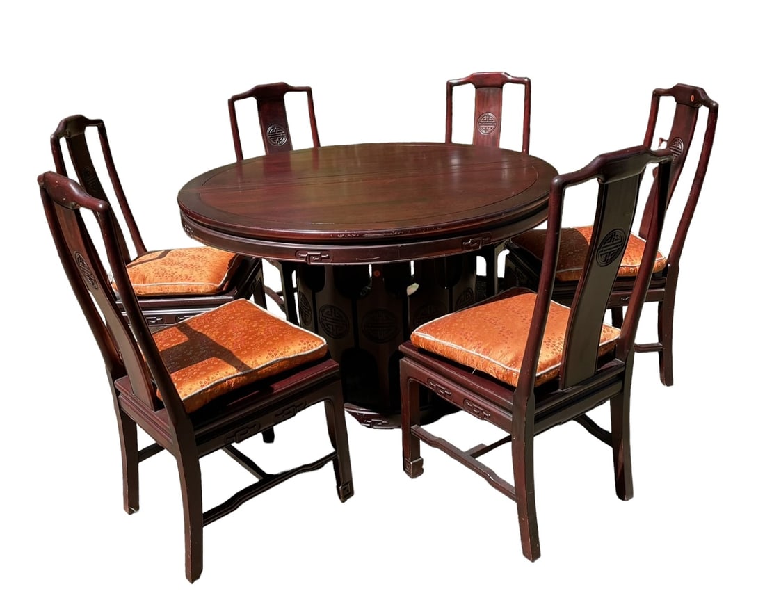 MID CENTURY ASIAN ROSEWOOD DINING TABLE W 6 CHAIRS: Asian mid 20th century Rosewood Ming Style 2 Pedestal Dining Table and Six mid 20th century Chinese Ming style dining chairs. Made of Rosewood featuring bentwood form with imperial crest and carved ac