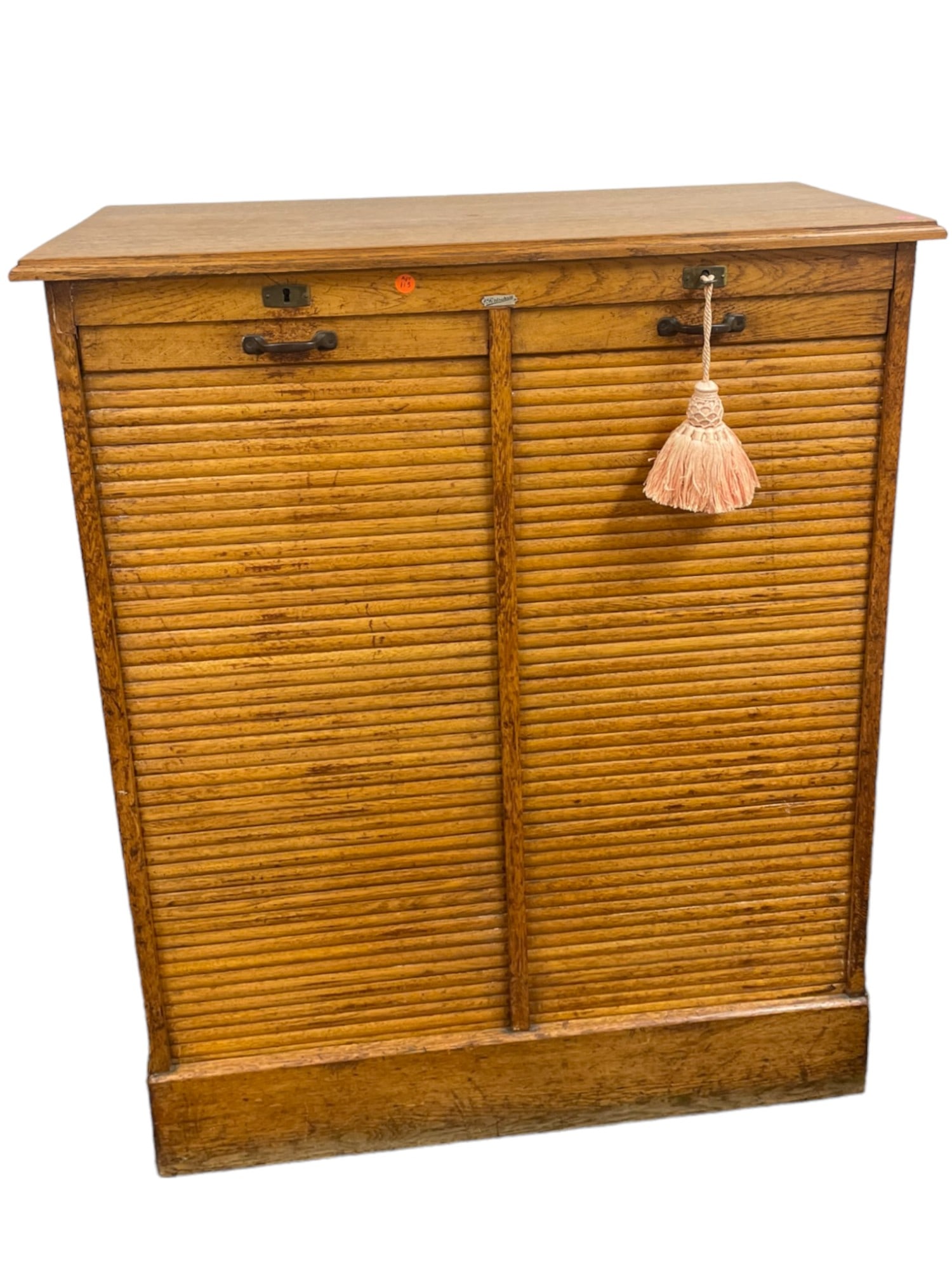 MID CENTURY OAK DOUBLE TAMBOUR DOOR CABINET: This is a fabulous 1950-60s Mid Century oak file cabinet with sliding / pull out file drawer / shelves. The attractive exterior features locking tambour doors that open to reveal a wonderful file syst
