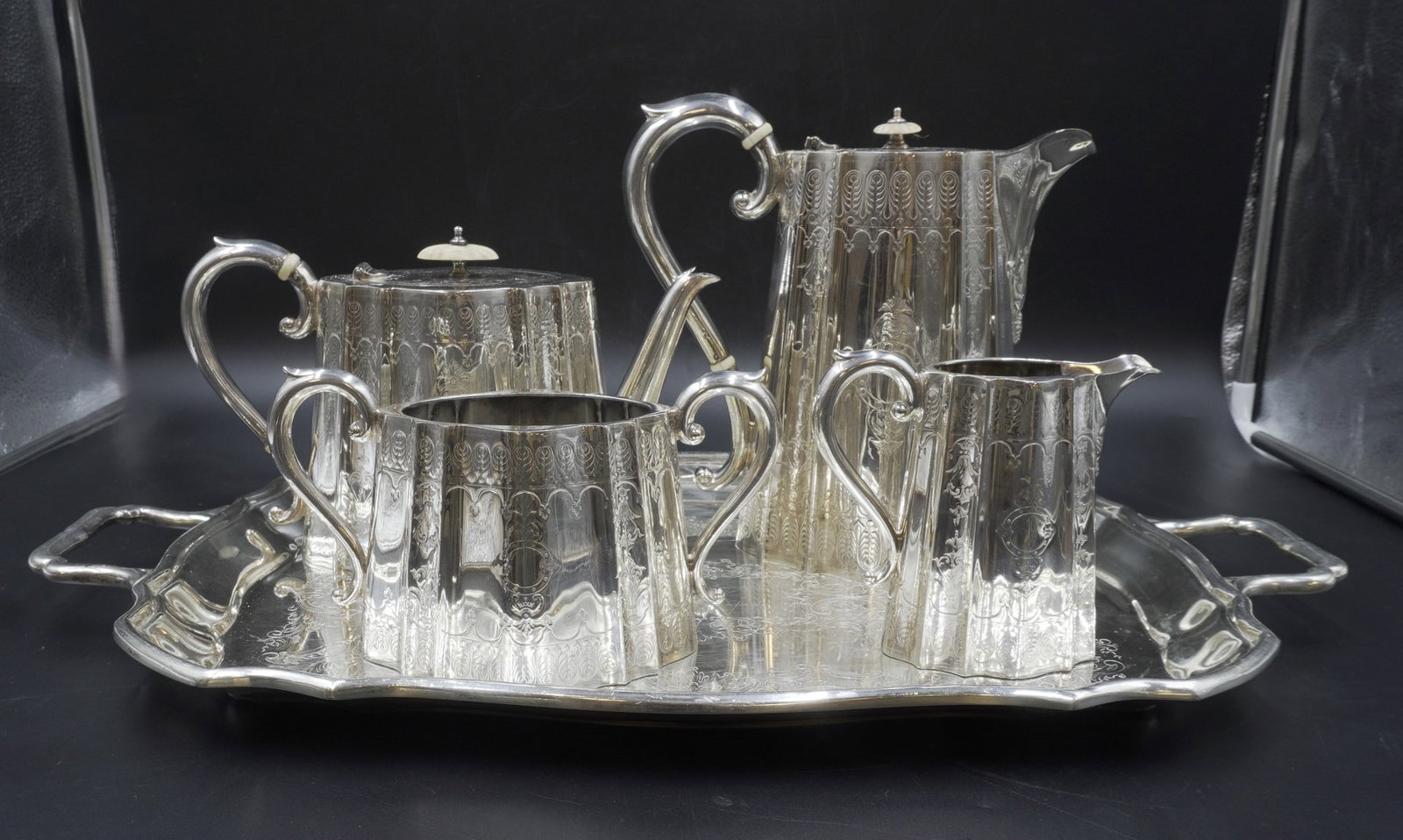 19th C AESTHETIC TEA / COFFEE SERVICE 5 PIECE: Antique 19th c Aesthetic Movement Silver Plate Coffee / Tea Service. Ornate Chased with Bone Finials. Includes Tray 22"x13". Coffee Pot 8.5". Tea Pot 6". Creamer 4.5". Sugar 4". Weight on all 8 lbs 9 