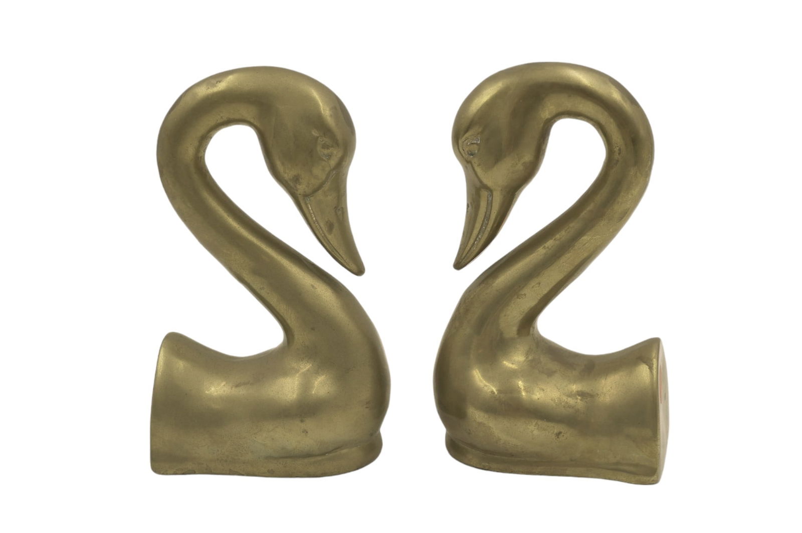 PAIR OF MID CENTURY BRASS SWAN BOOKENDS: Pair of Vintage Mid-Century Brass Swan Bookends. Each measures about 8" tall, 4.25" long, and 3.25" wide. Total lot weight is 7 lbs 8 oz.