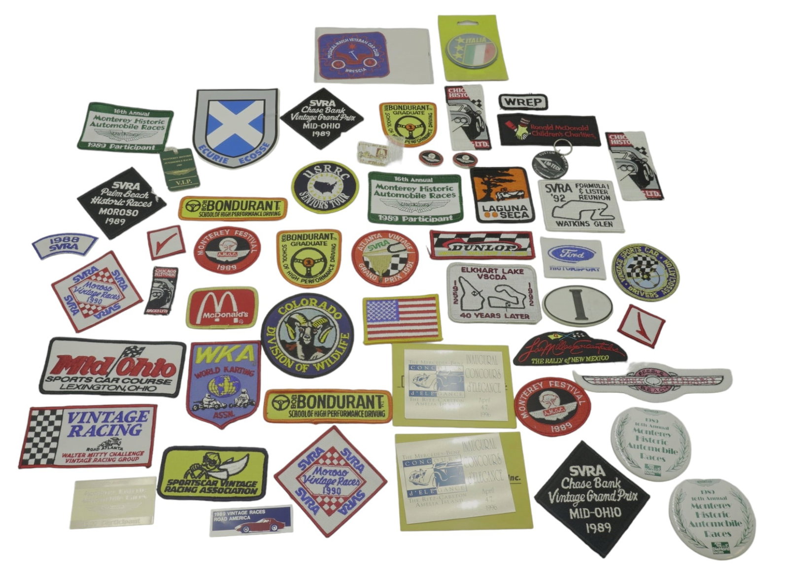 LARGE GROUP OF CAR MEMORABILIA PATCHES - STICKERS: Large Group of Vintage Automobile Memorabilia from numerous car shows etc. Patches, Stickers, Bades and more. Box 11"x9"x1.5". Weight 1 lb 6 oz.PROVENANCE: Terri Henning, The Peoples Building Penthous