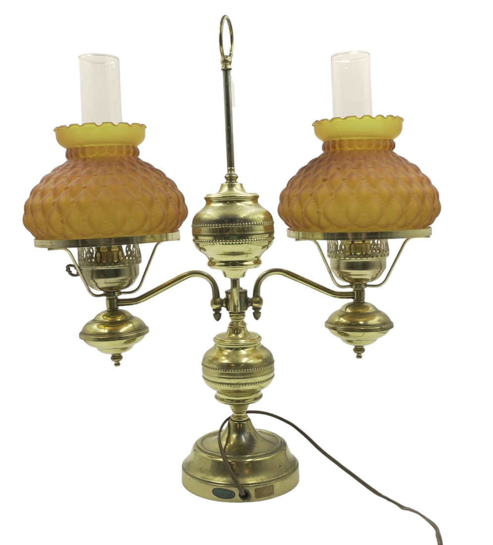 MID CENTURY BRASS DOUBLE STUDENT LAMP WITH QUILTED AMBER SATIN GLASS SHADES: Mid Century Brass Double Student Lamp with Amber Quilted Satin Glass Shades. Includes all original wiring and glass hurricane shades underneath the Satin ones. Measures 23.5" tall, 19" long, and 6.75"