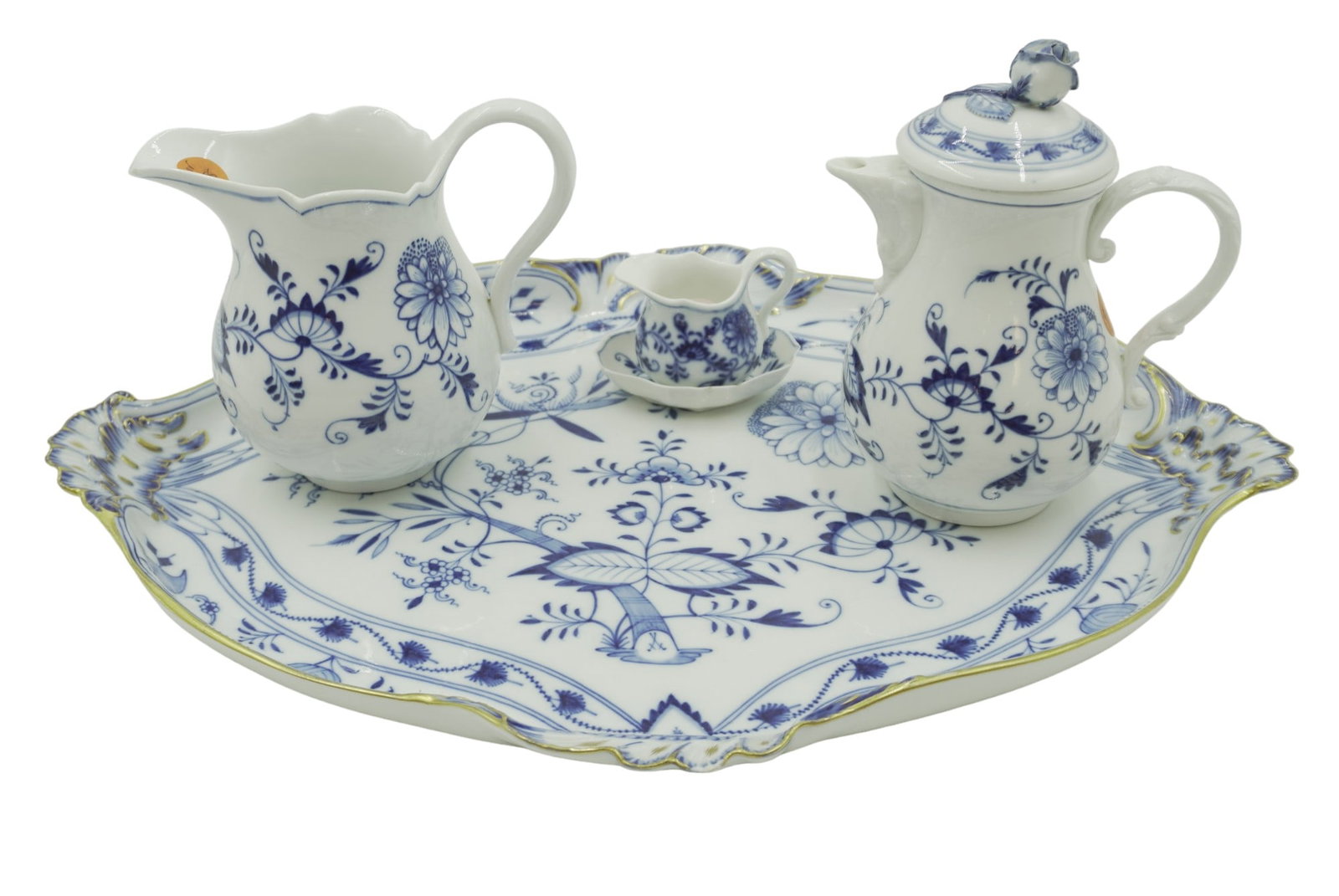 4 pc ANTIQUE MEISSEN TRAY PITCHER +: All are Antique Meissen. Large 12.5"x18" Platter, chip to rim. Milk Jug 5.5", tiny nick to rim, Small Chocolate Pot 6.5". Miniature Jug and Underplate 2.5", nick to Underplate. Weight on all 5 lbs.