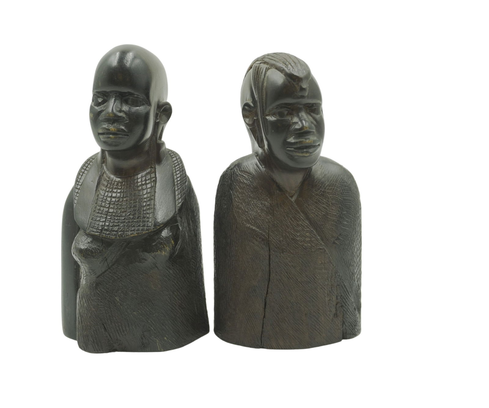 PAIR OF AFRICAN EBONY WOOD CARVINGS: Pair of African Ebony Wood Carved Sculptures from Uganda. Each measures about 5.5" tall. Total lot weight is 1 lb 2.7 oz.