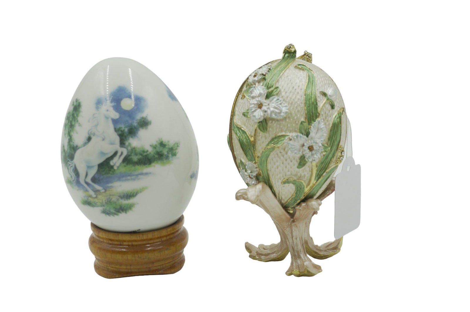 PAIR VINTAGE DECORATIVE EGGS: Pair of Vintage Decorative Eggs on stands. One Godinger Silver Art Co. Jeweled Egg Trinket Box and Princeton Gallery Unicorn on Stand. Total lot weight is 12.5 oz.