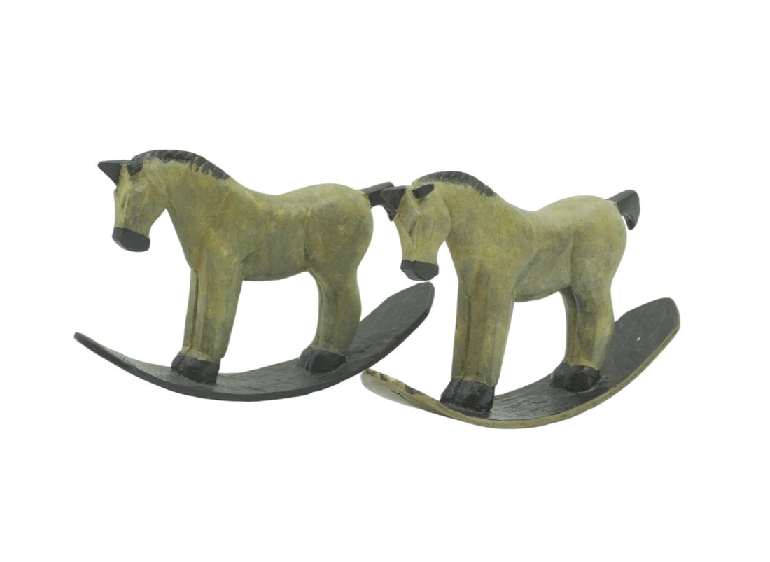 2 BRONZE COLD PAINTED FOLK ART ROCKING HORSE: 2 Cold Painted Bronze Rocking Horses. Folk Art. Each 4.25"x1"x3.25". Weight combined 1 lb 5 oz. PROVENANCE: Terri Henning, The Peoples Building Penthouse,18 Broad Street, Charleston SC, as seen in Arc