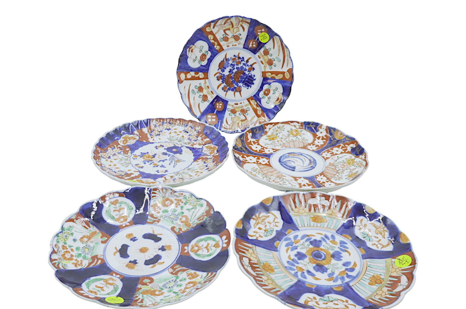 5 ANTIQUE JAPANESE IMARI PLATES: Group of 5 Good Antique Japanese Imari Plates. Scalloped edges, hand painted panels in red, blue, white and green colors. 5 at 8.75". Some chips to rims. Weight on all 5 lbs .. PROVENANCE: The Charles
