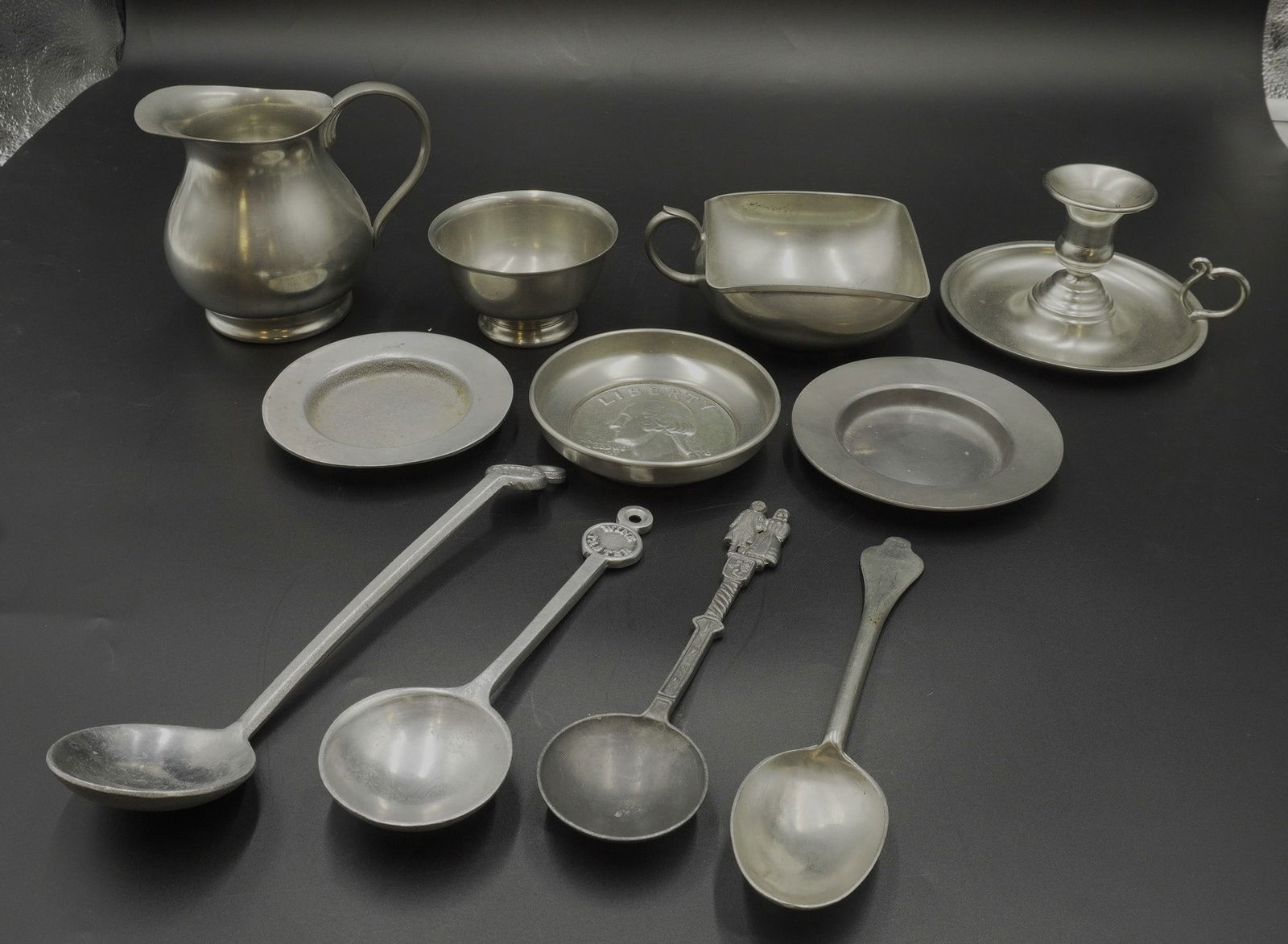 10 PIECES OF VINTAGE PEWTER: This lot includes 1) Metawa Holland Candlestick Holder 2) Royal Holland Cream Pitcher 3) Square Bowl with Handle 4) 2 Pewter Dishes, one marked on bottom "B" 5) Presner Pewter Quarter Small Dish 6) Sm