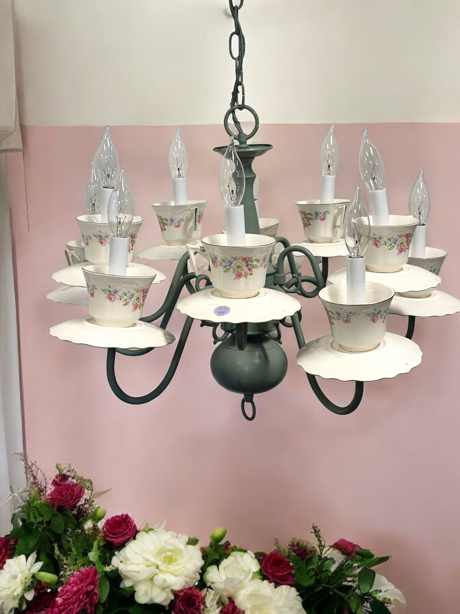 WHIMSICAL 10 ARM PORCELAIN TEACUPS CHANDELIER: Whimsical 10 Arm Porcelain Teacup and Saucer Chandelier. Measures 26"x23"x19"(without chain). Chain add 8". Weight approximately 12 lbs.
