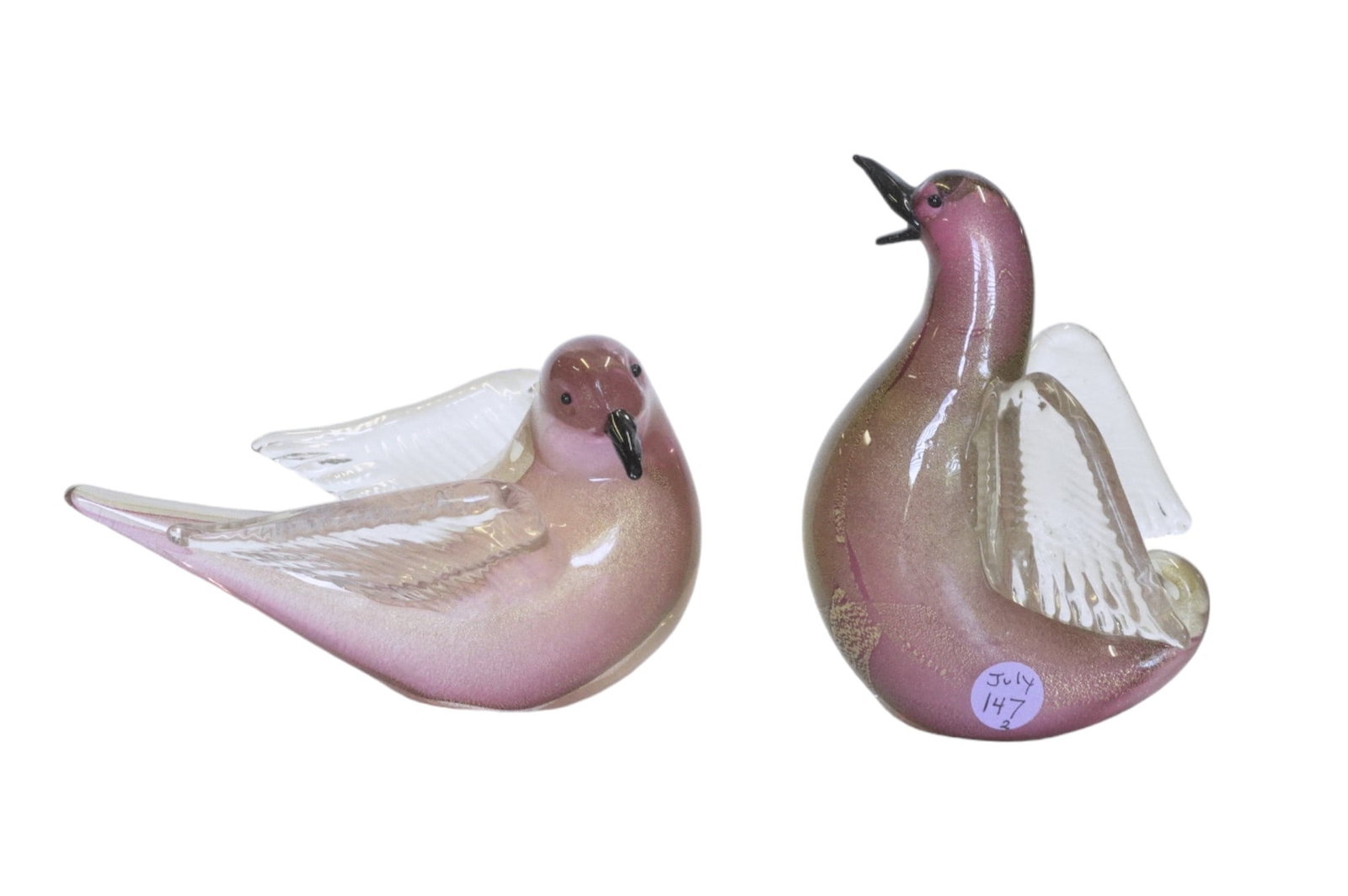 PAIR FORMIA VETRI DI MURANO ART GLASS BIRDS: Pair of Italian Formia Vetri Di Murano Art Glass Birds. Two Formia Vetri di Murano blown glass birds, each having rose hued bodies with gold aventurine, clear wings, and black beaks and eyes. 6.5"x4.3