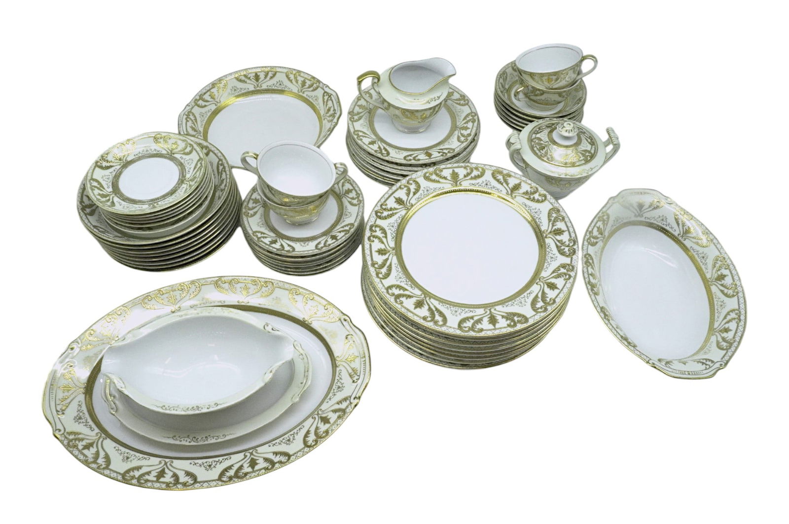 55 PC OCCUPIED JAPAN REGAL DEAN & KITE CHINA: Dean & Kite "Regal" Bone China, Mid-20th Century, made in Occupied Japan. Heavy gold gilt on white. 8 Dinner Plates 10". 6 Fruit Bowls 5.5". 8 Bread & Butter 6.25". 7 Salad 7.5". 8 Coupe Soup 7.5". 1