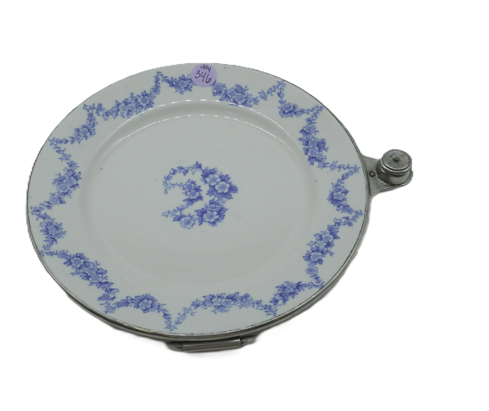 ANTIQUE EMPRESS WARE PORCELAIN AND METAL WARMING PLATE: Antique Empress Ware Porcelain & Metal Warming Plate with Screw Top Fill Hole. Measures 8.75" in diameter and weighs 2 lbs 3 oz.