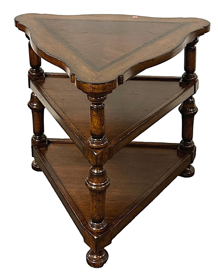 LEXINGTON TRIANGULAR WOOD TABLE: Lexington Solid Wood Triangular Table with lower shelf. Measures 29"x26.5"x26". PROVENANCE: A Daniel Island Private Estate