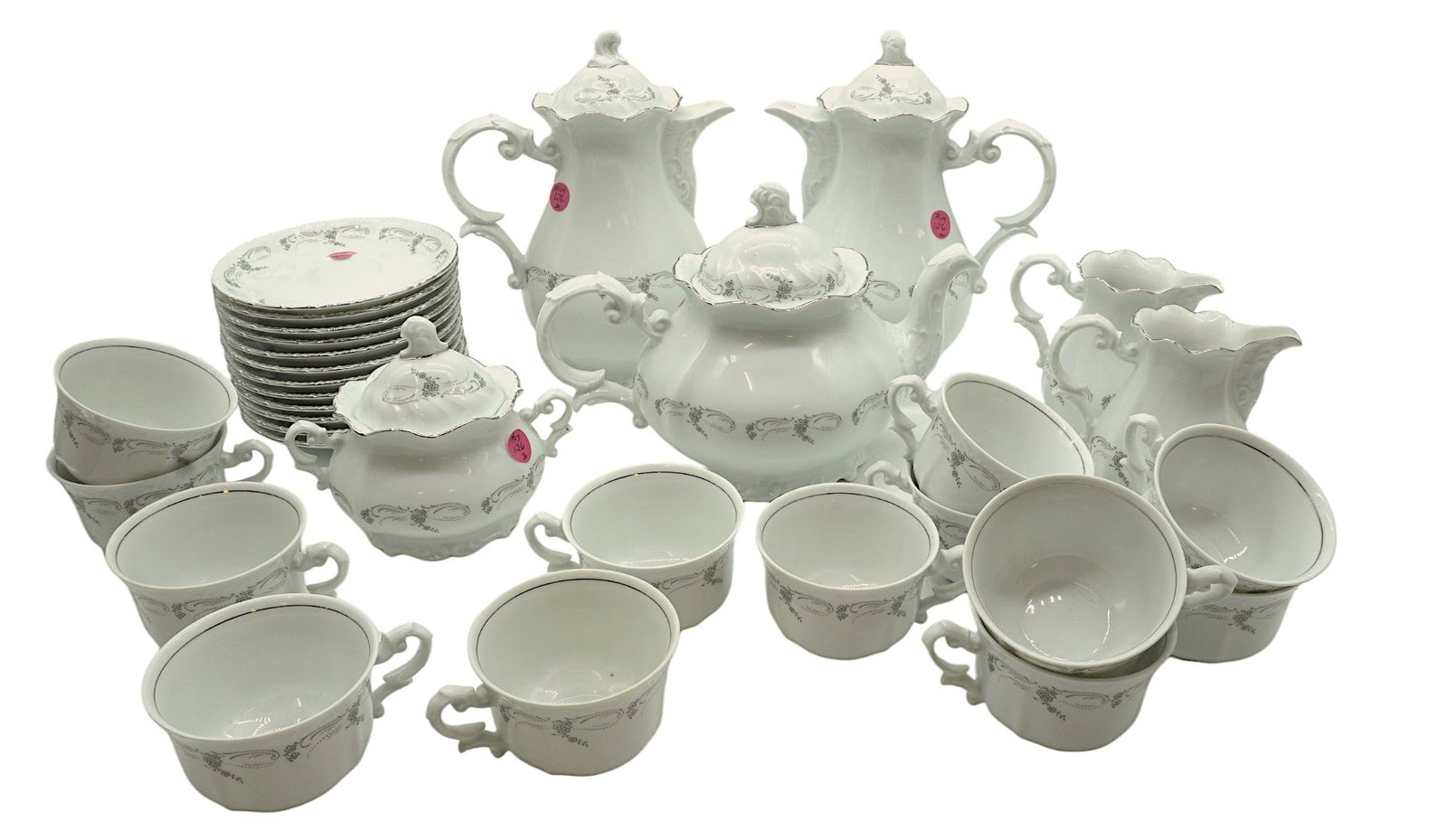 30 PC CAPEANS PORCELANA ESPANA COFFEE SERVICE: Stunning Capeans Porcelana Espana Coffee Service 30 Piece. This pattern features a soft enameled floral pattern of gray and gold against a white porcelain background. The outer rim of the scalloped pi