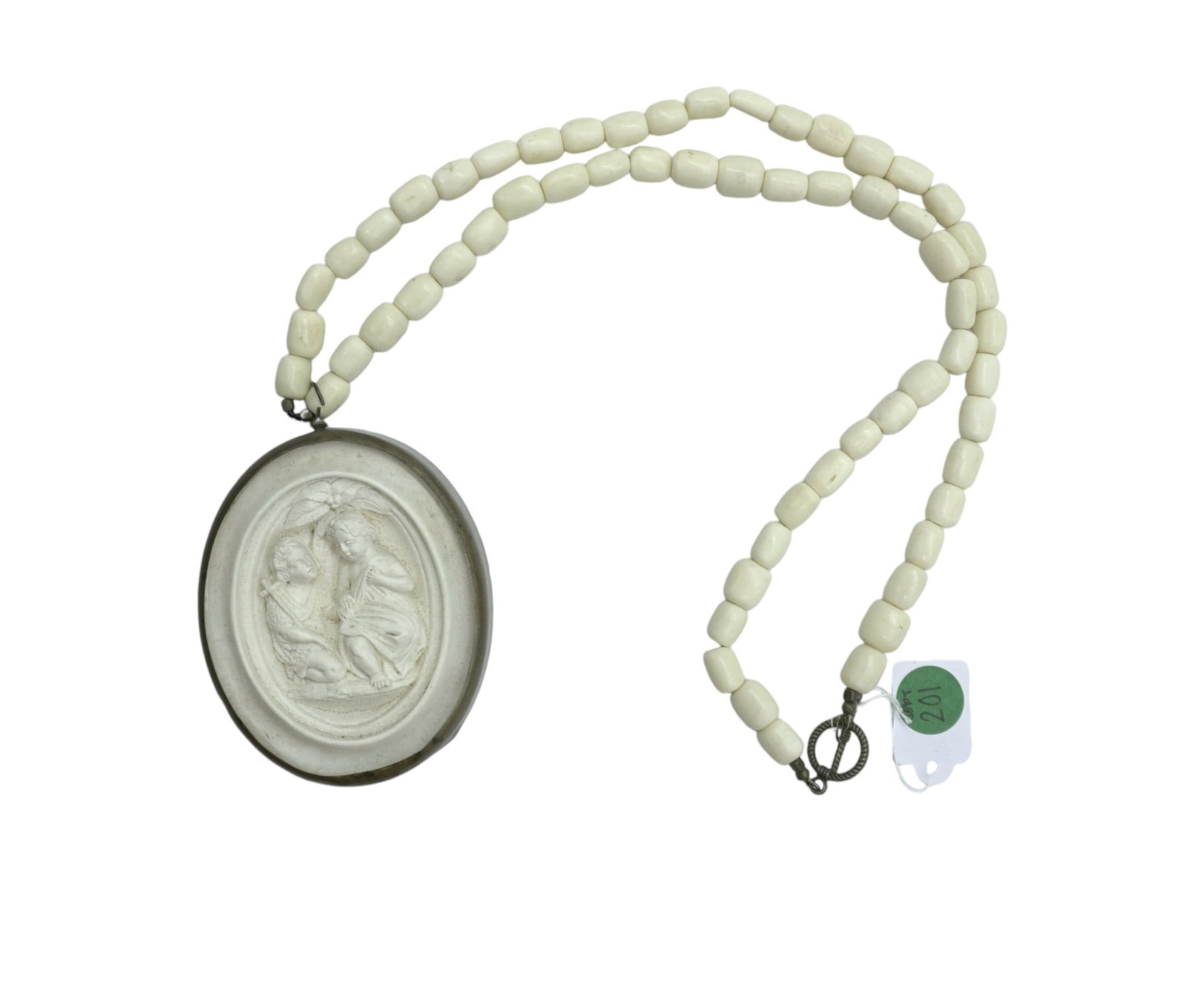 ANTIQUE FRENCH MEERSCHAUM ON BONE NECKLACE: Antique French Meerschaum pendant encased in brass and hung on a string of hand carved bone bead necklace with brass clasp. An absolutely stunning and rare find. Pendant measures 3.75" x 3" and neckla