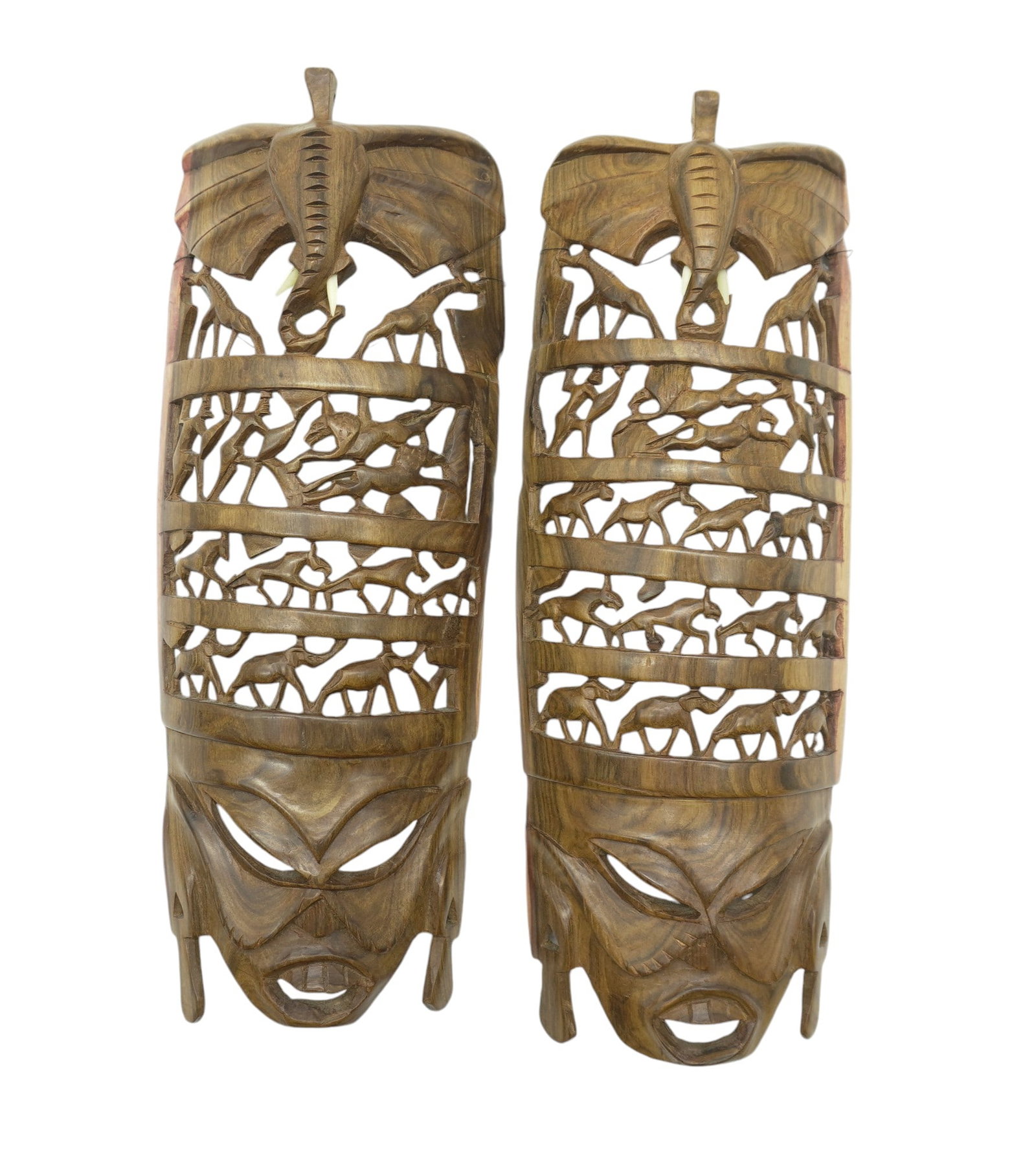 PAIR HAND CARVED AFRICAN ANIMAL MASKS: Pair of Hand Carved Wood African Animal Masks. Each 4.5"x12"x2". Weight 12 oz.