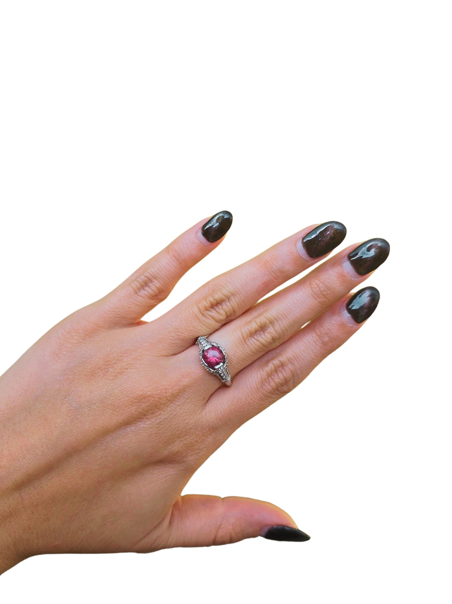 PINK TOURMALINE & DIAMOND PLATINUM RING: Pink Tourmaline and Diamond Ring size 5.5 with sizing beads that can be removed to make the ring size 6. Unmarked, tests for platinum. The tourmaline measures approximately 6.30mm, weighing approximat