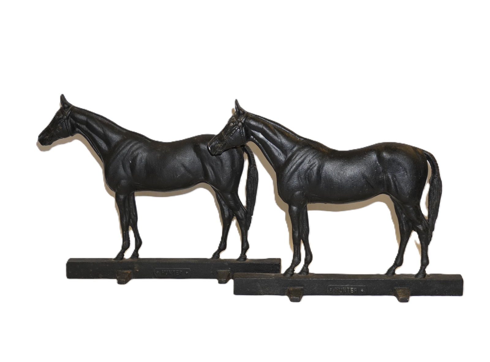 PAIR 1949 METALCRAFTERS EQUESTRIAN DOOR STOPS: Pair of 1949 Metalcrafters Equestrian Horse Cast Iron Doorstops "Hunter". Each12"x3"x10.25" Weight combined 8 lbs 10 oz.