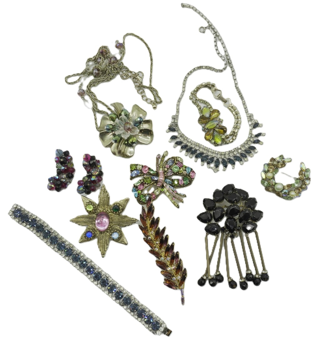 10 pc VINTAGE ESTATE RHINESTONE JEWELRY: Fabulous Group of Vintage Estate Rhinestone & Crystal Costume Jewelry 1950s-1970s. 1-Long Topaz and Aurora Borealis Leaf Brooch 4". 2- Purple Crystal and Aurora Borealis Clip on Earrings 1.5". 3- Blue