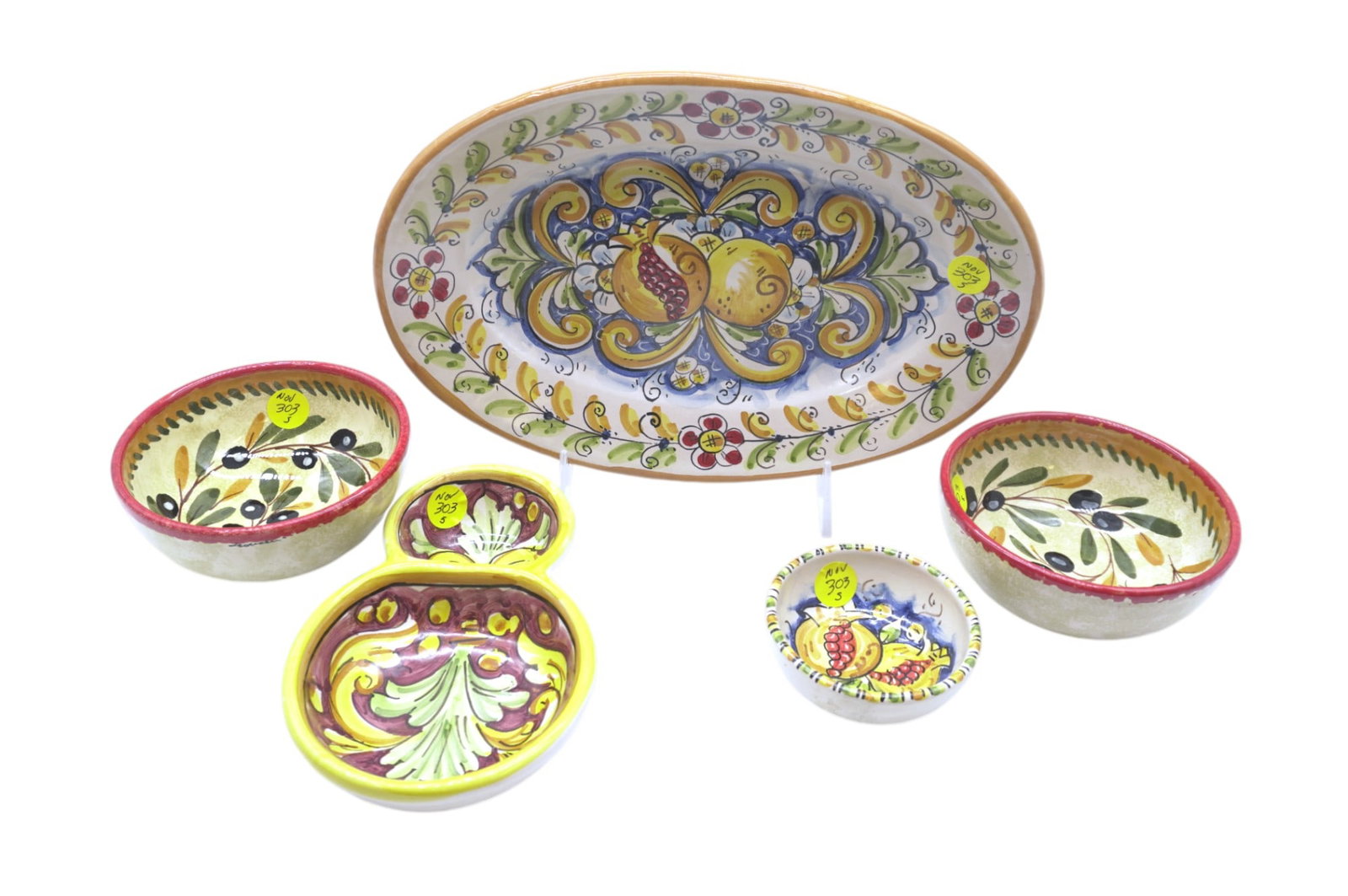 5 Pc ITALIAN HAND PAINTED POTTERY: 2 Olive Bowls 4.75"x2.25. 1 Olive & Pit Bowl 6.75"x4.25"x1.25". Serving Bowl 11.5"x7.5"x1.5". Small Bowl 3.25"x1.25". Weight combined 3 lbs 6 oz.