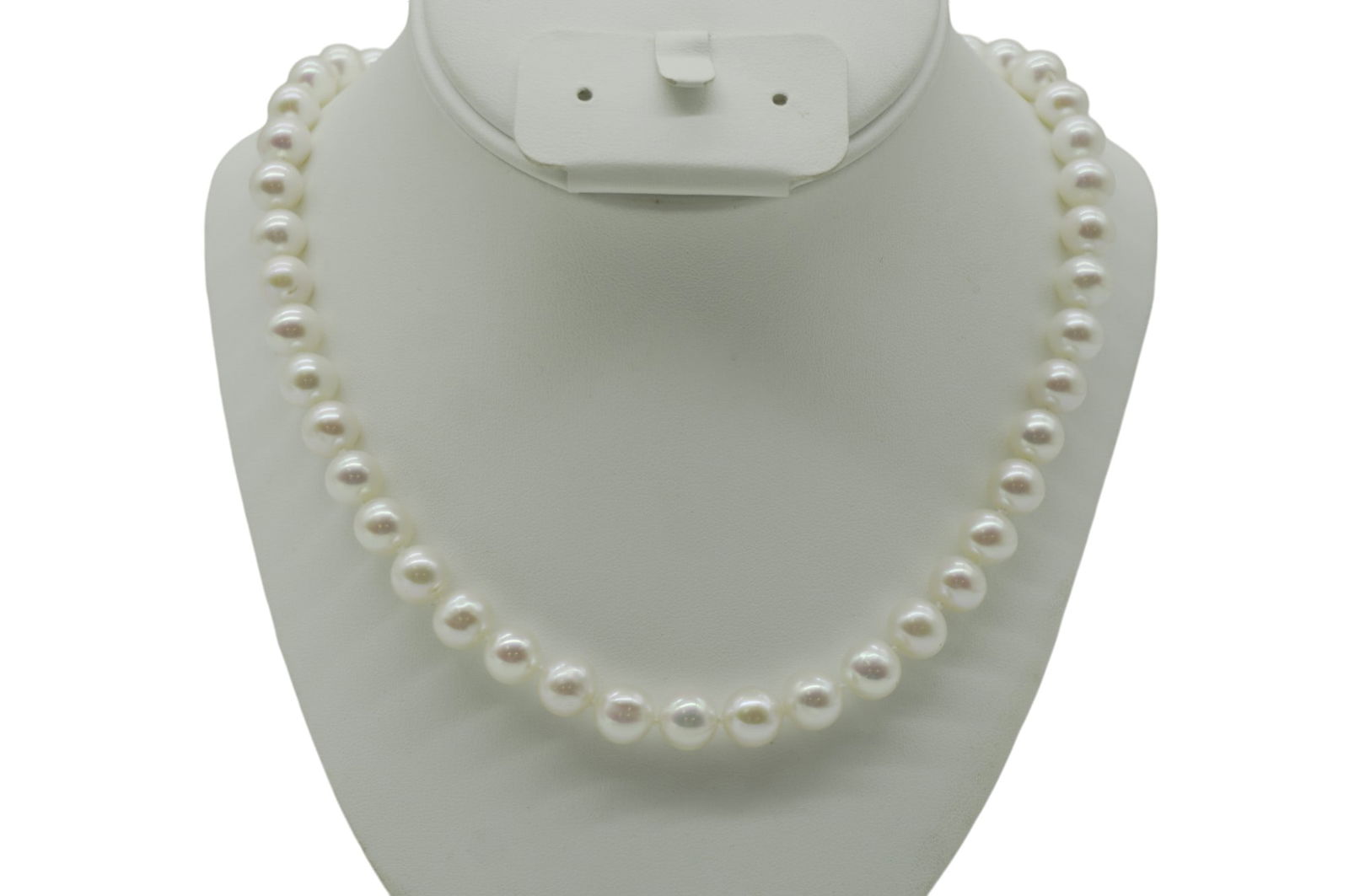 ESTATE SOFIA 24" PEARL NECKLACE 14K CLASP: From an estate collection,one strand of pearls, Branded by Sofia, cultured pearls, measuring 24 inches in length, approximately 9.00mm x 9.40mm in size (63) pearls in total,knotted on silk. The clasp
