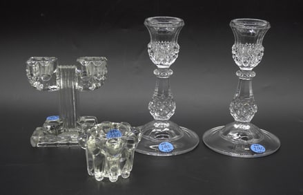 4 CRYSTAL AND GLASS CANDLESTICK HOLDERS