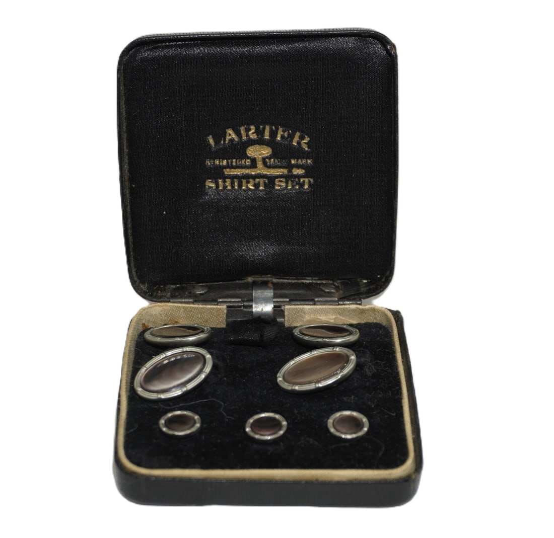 ART DECO LARTER SHIRT SET: An Art Deco shirt set featuring dark abalone centers surrounded by reeded white rolled gold plated borders. The iridescent centers are alive with flashes of green and dark purple. Crafted by Larter &